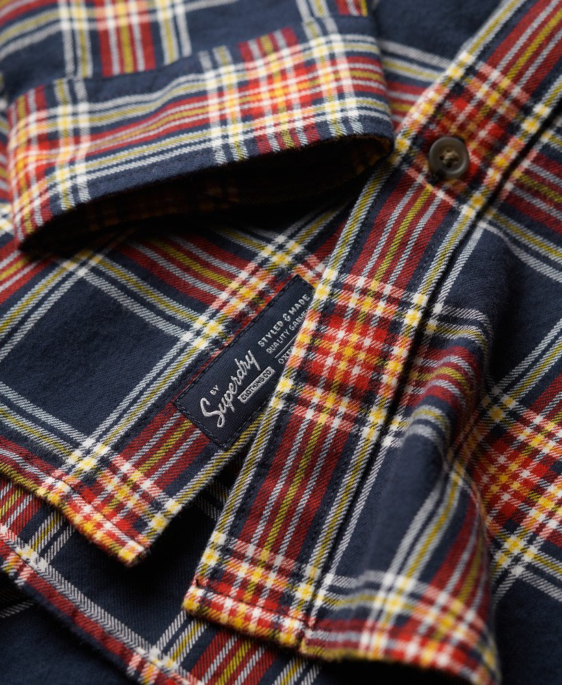 camisa xadrez vintage em algodão orgânico na cor azul marinho.