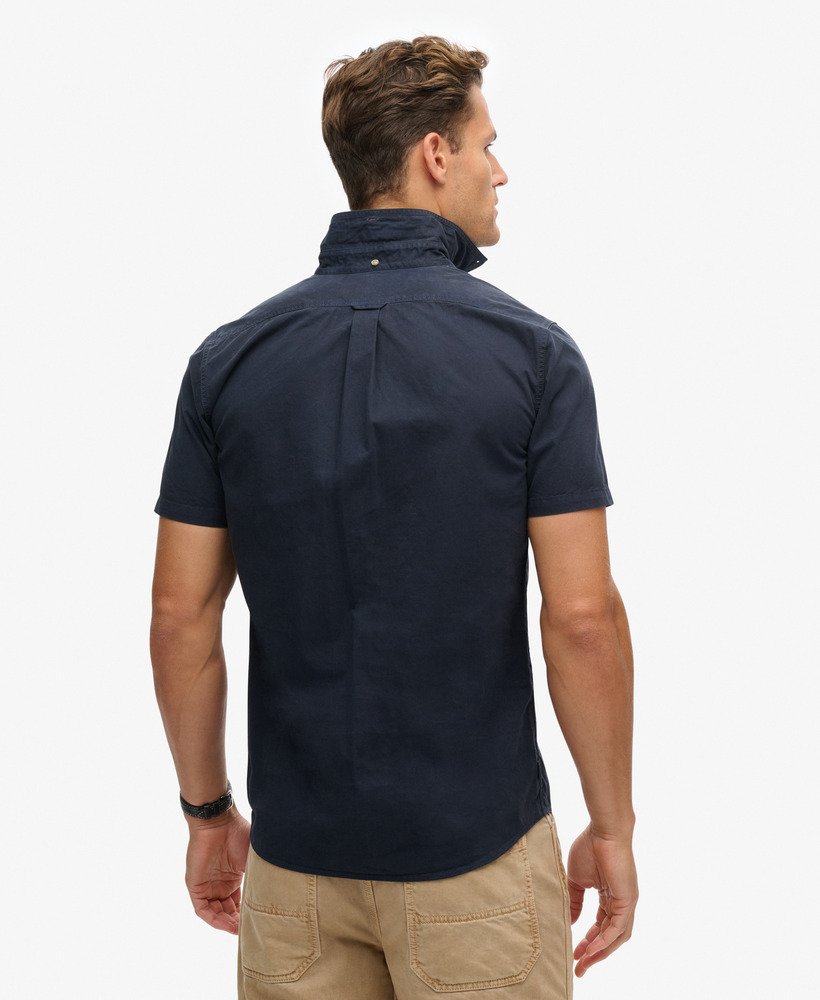 camisa de manga curta da the merchant store na cor azul marinho eclipse.