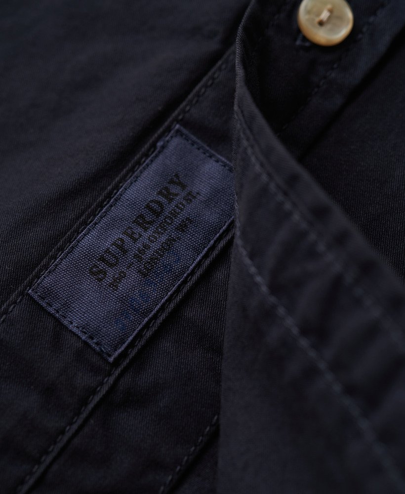 camisa de manga curta da the merchant store na cor azul marinho eclipse.
