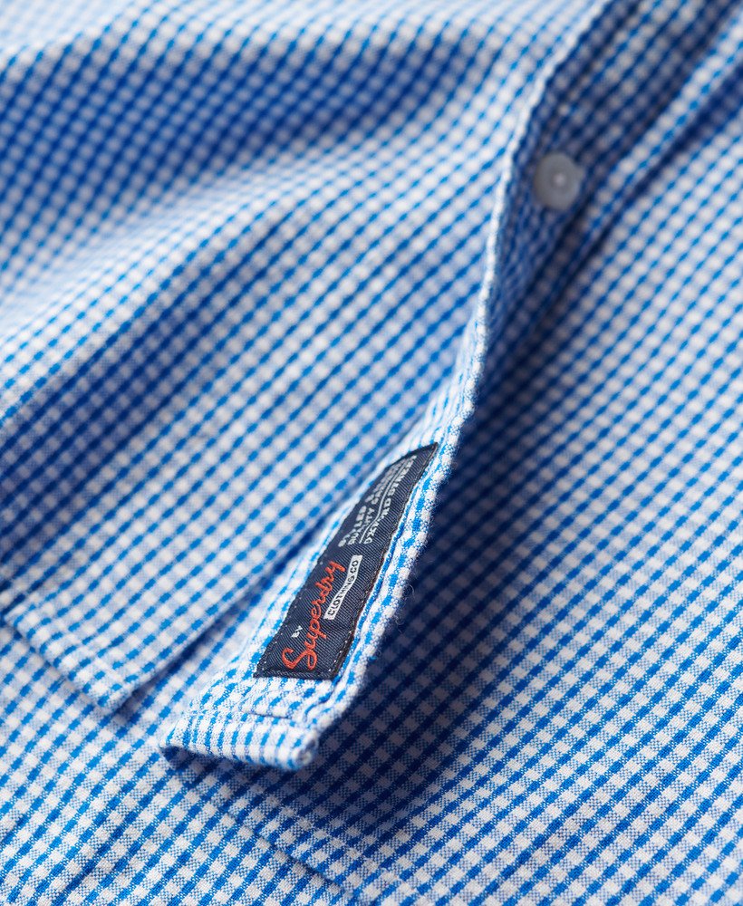 camisa de manga curta em tecido seersucker com estampa xadrez royal gingham.