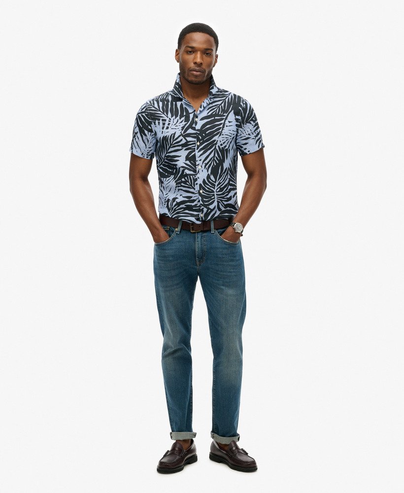 camisa de linho estampada com gola aberta na cor azul philip palm.