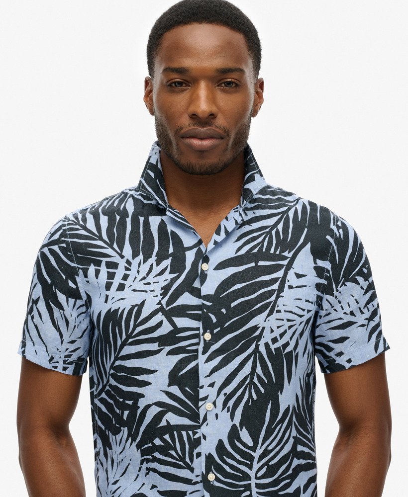 camisa de linho estampada com gola aberta na cor azul philip palm.