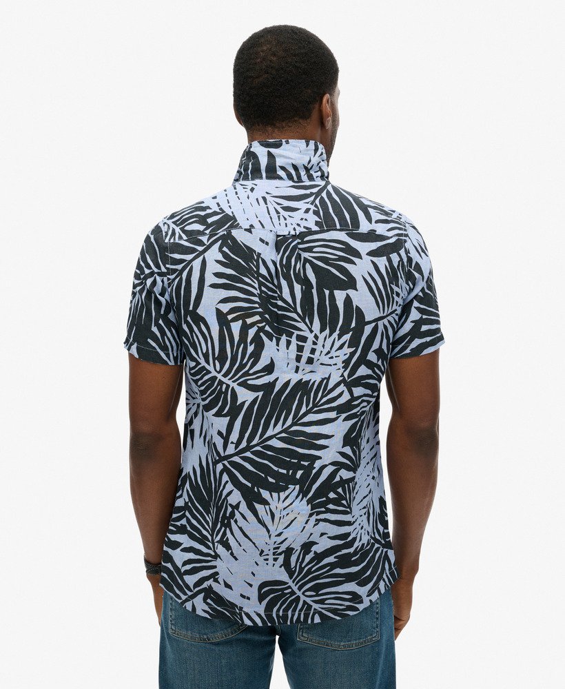 camisa de linho estampada com gola aberta na cor azul philip palm.