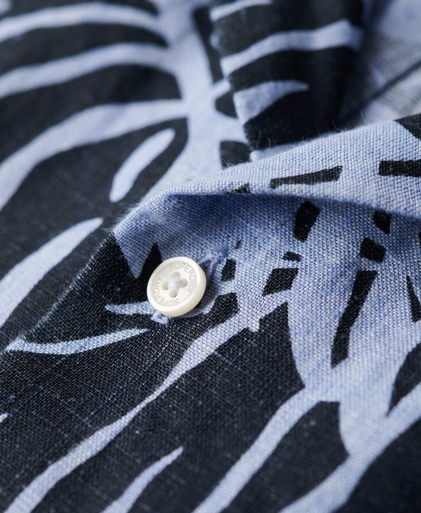 camisa de linho estampada com gola aberta na cor azul philip palm.