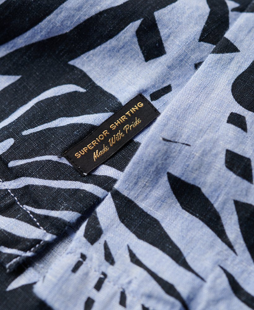 camisa de linho estampada com gola aberta na cor azul philip palm.