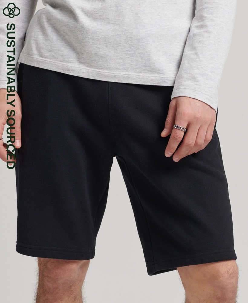 shorts de malha com logo vintage em algodão orgânico na cor preta.