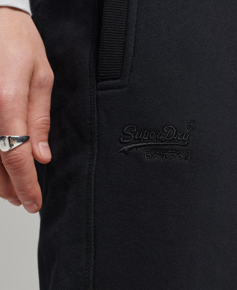 shorts de malha com logo vintage em algodão orgânico na cor preta.