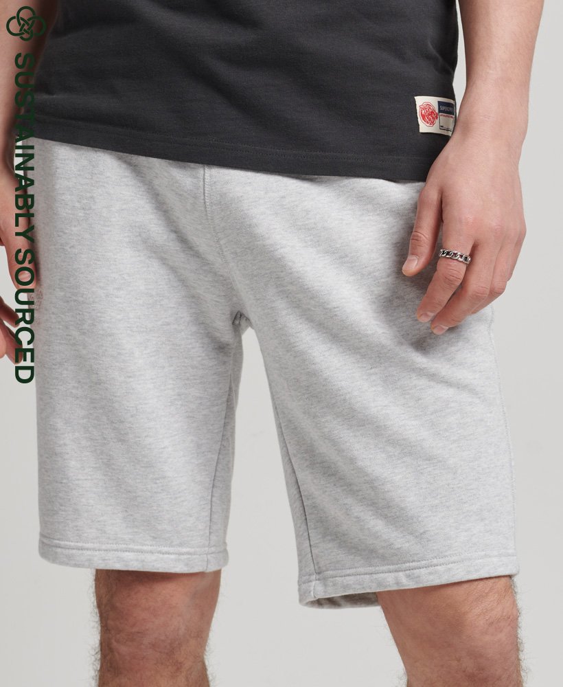 shorts de malha com logo vintage em algodão orgânico na cor cinza mesclado glaciar.