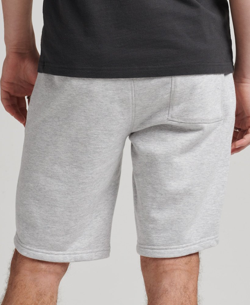 shorts de malha com logo vintage em algodão orgânico na cor cinza mesclado glaciar.