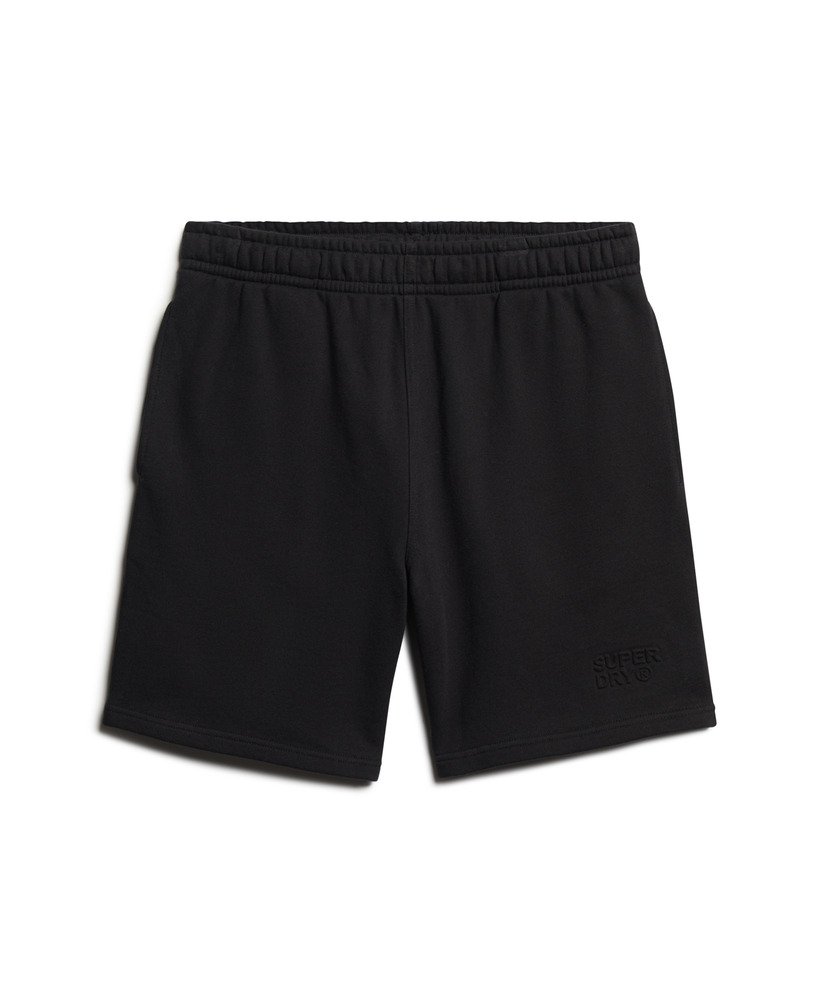 calções folgados com relevo da sportswear na cor preta.