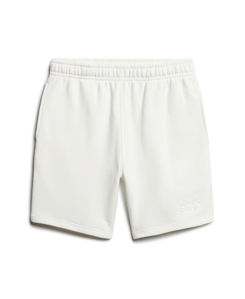 calções folgados com relevo da sportswear na cor branca giz.