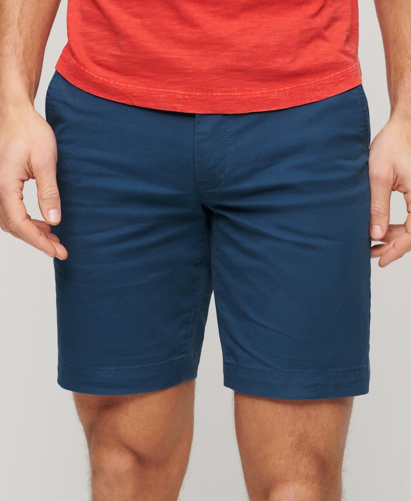 calções chino elásticos na cor azul médio da pilot.