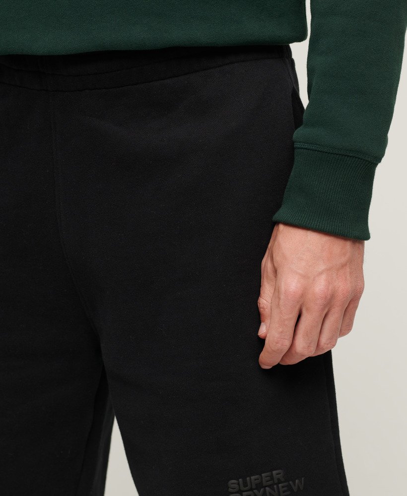 calções de luxo desportivos e folgados em preto.