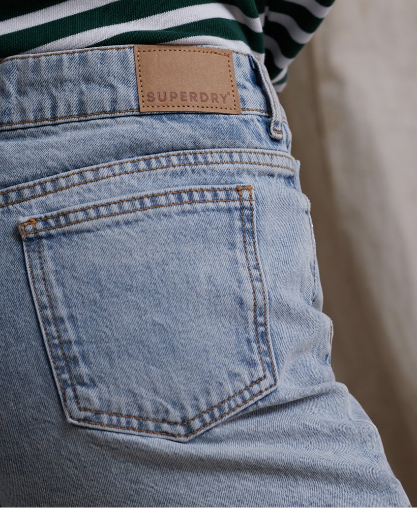 shorts jeans de comprimento médio na cor bleach indigo clean