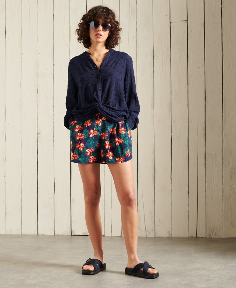 shorts paperbag estampados em estampa floral azul-marinho
