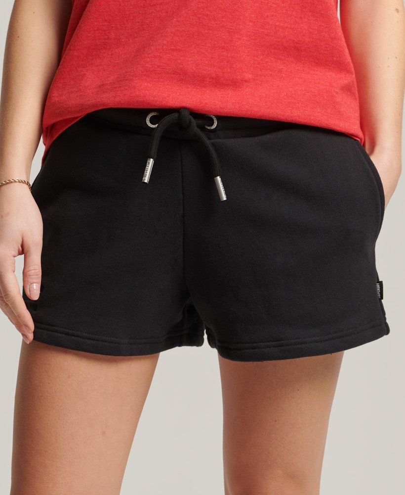 shorts de malha com logo vintage em algodão orgânico na cor preta.