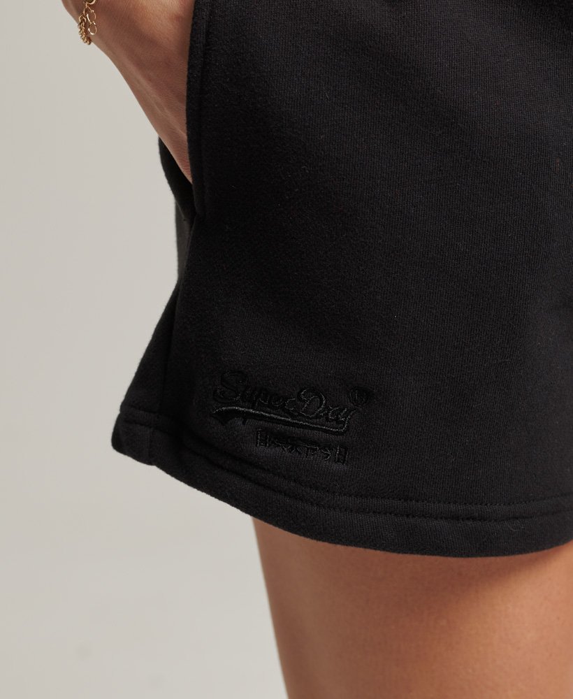 shorts de malha com logo vintage em algodão orgânico na cor preta.