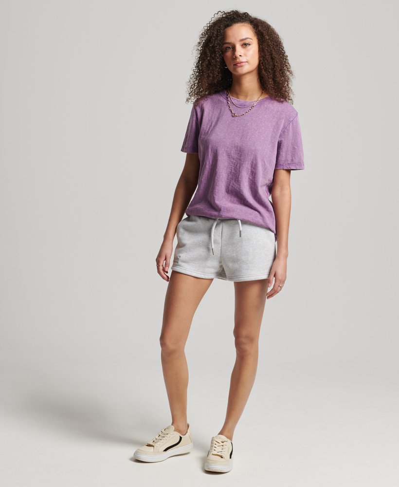 shorts de malha com logo vintage em algodão orgânico na cor cinza mesclado glaciar.