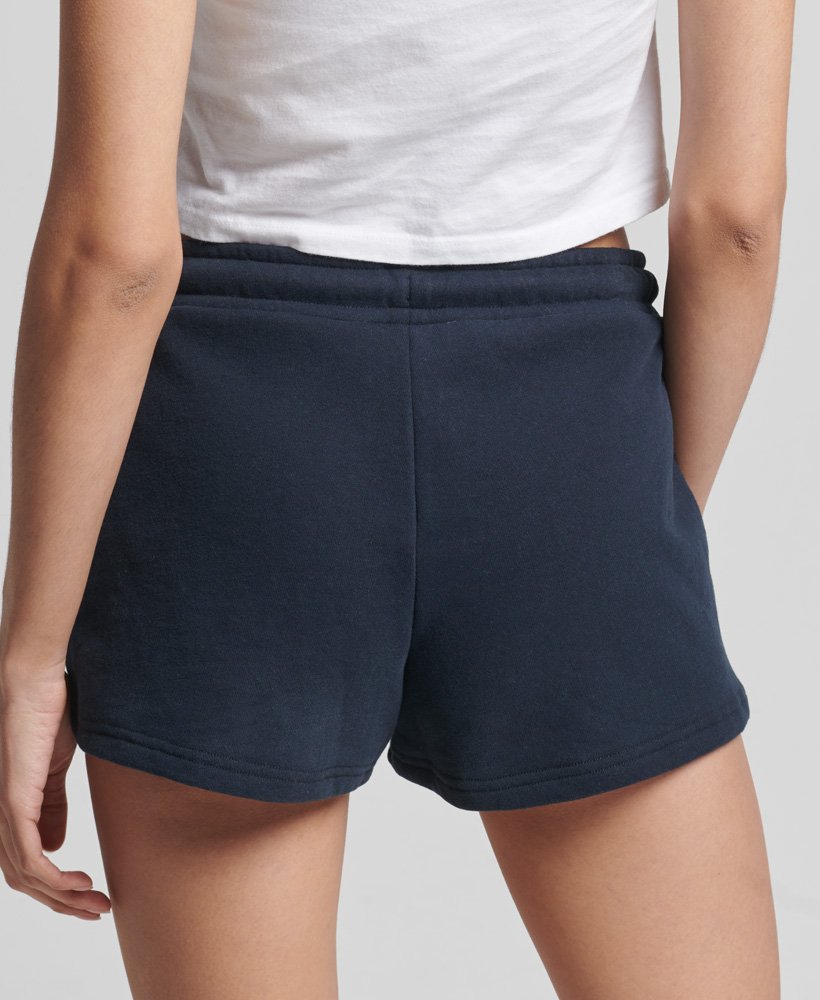 shorts de malha com logo vintage em algodão orgânico na cor azul-marinho eclipse.