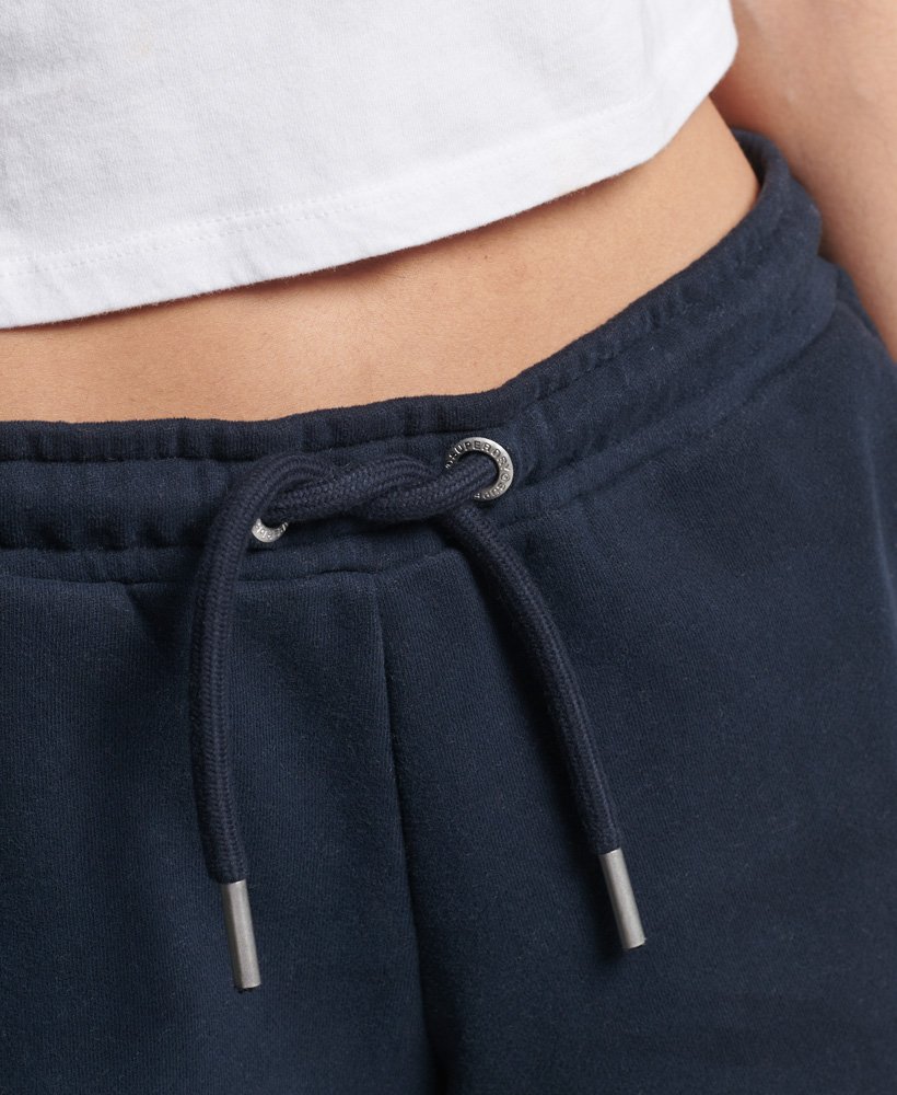 shorts de malha com logo vintage em algodão orgânico na cor azul-marinho eclipse.