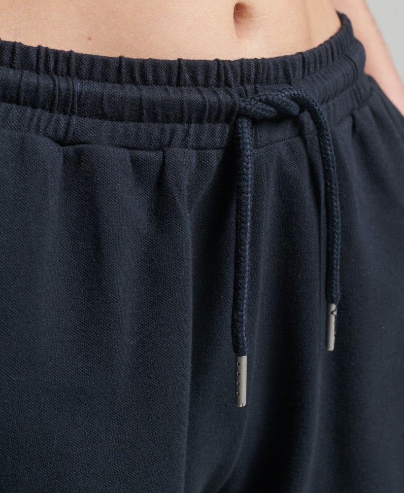 shorts racer vintage stripe em algodão orgânico na cor azul marinho eclipse
