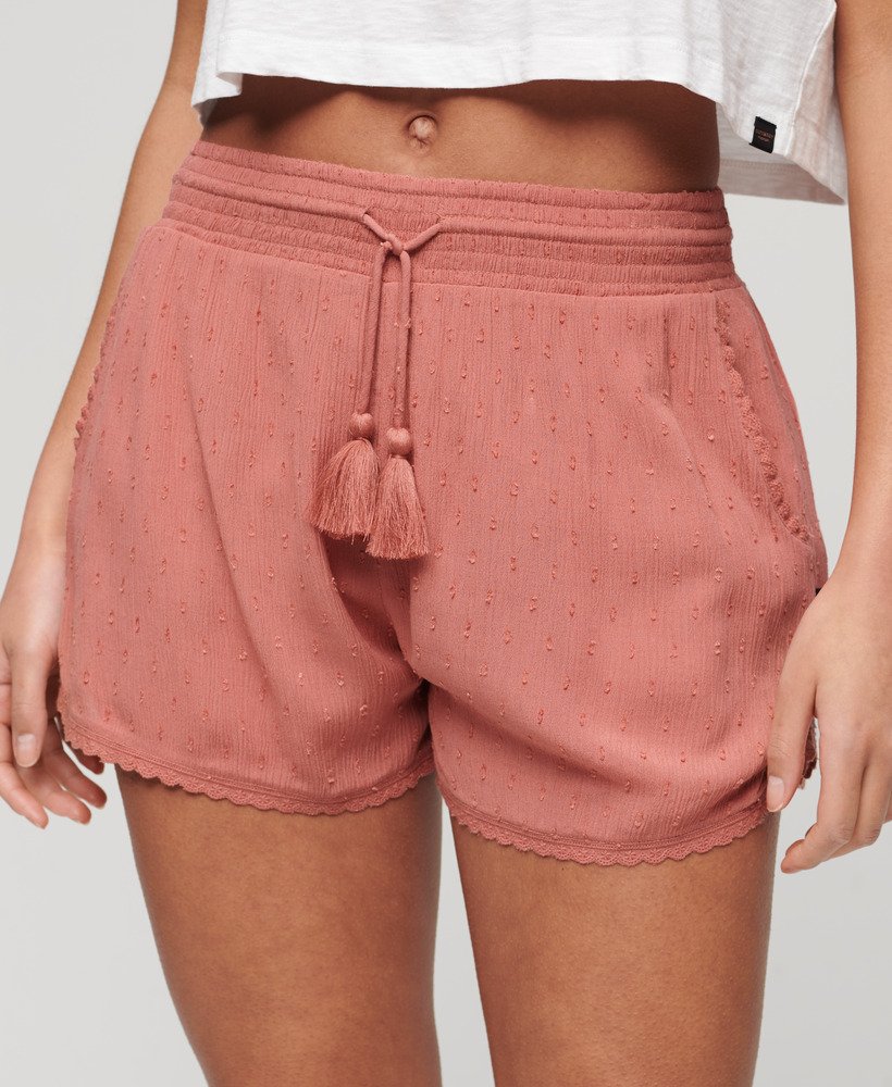 shorts de praia vintage na cor rosa-fumê