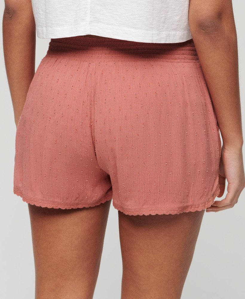 shorts de praia vintage na cor rosa-fumê