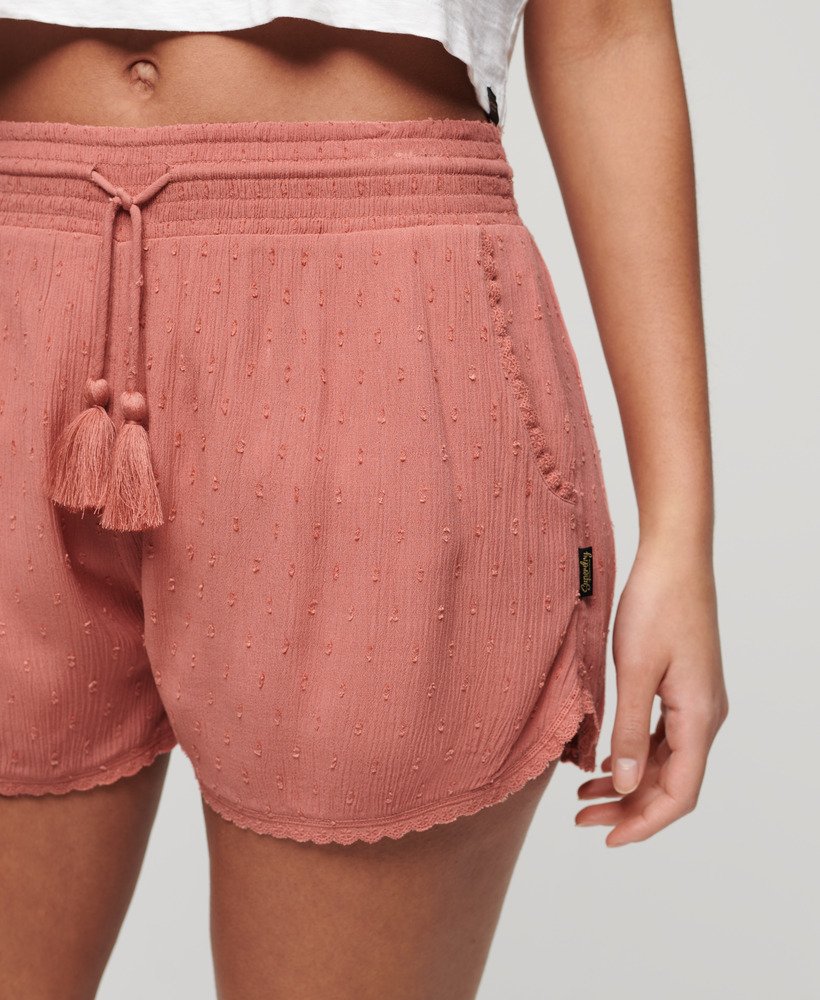 shorts de praia vintage na cor rosa-fumê