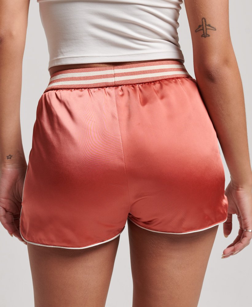 calções suika racer na cor pêssego coral
