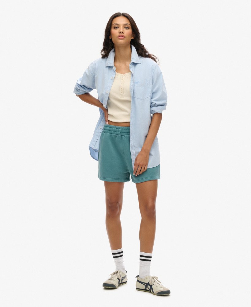 shorts de moletom com lavagem vintage na cor turquesa escuro hydro.