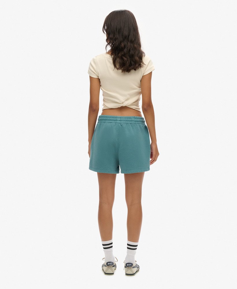 shorts de moletom com lavagem vintage na cor turquesa escuro hydro.