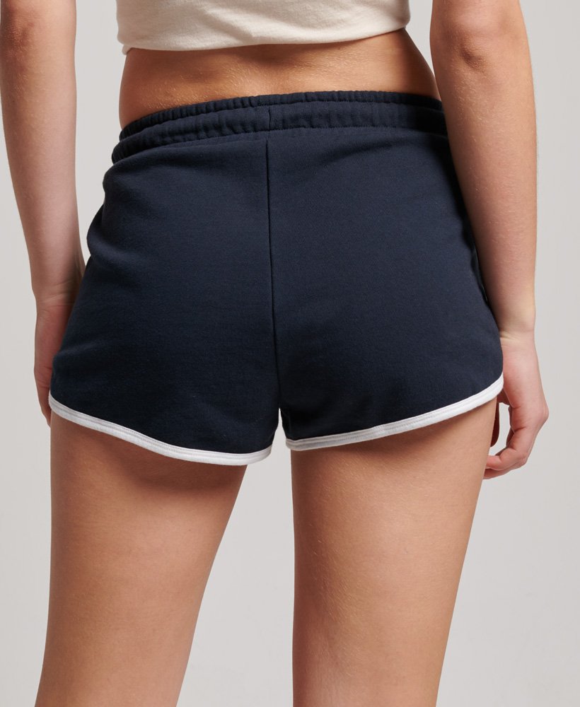 shorts de corrida vintage em malha na cor azul marinho eclipsebranco óptico.