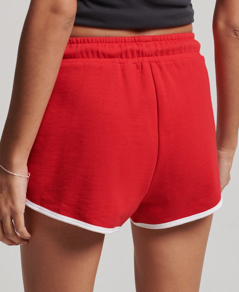 calções de corrida vintage em jersey nas cores vermelho universitáriobranco óptico.