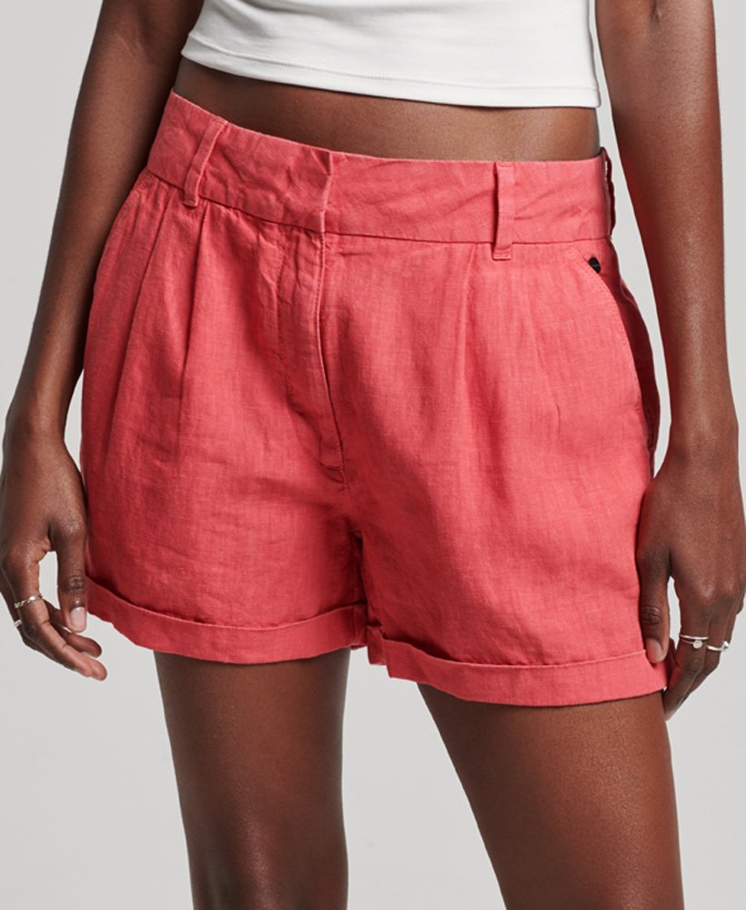 shorts de linho tingidos em tom rosa vibrante.
