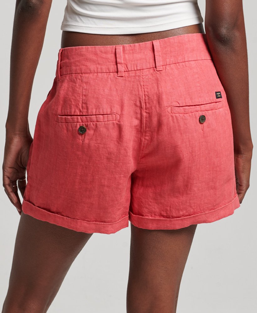 shorts de linho tingidos em tom rosa vibrante.