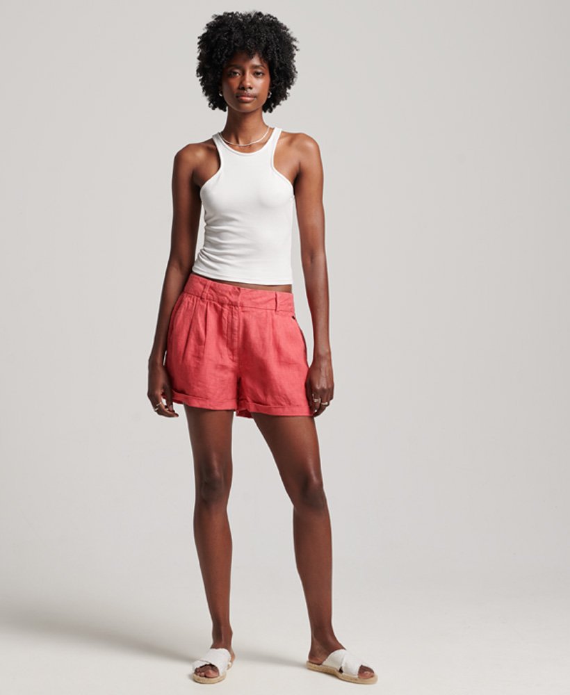 shorts de linho tingidos em tom rosa vibrante.
