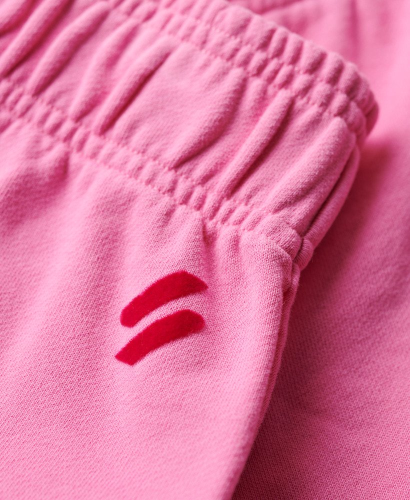 calções esportivos com logo racer na cor rosa paparazzi