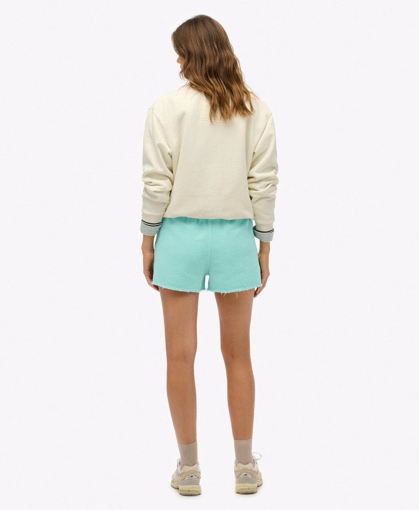 Shorts tingidos com o logotipo essencial