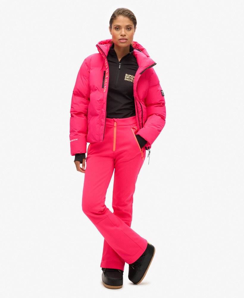 calças de esqui slim em softshell na cor rosa vibrante.