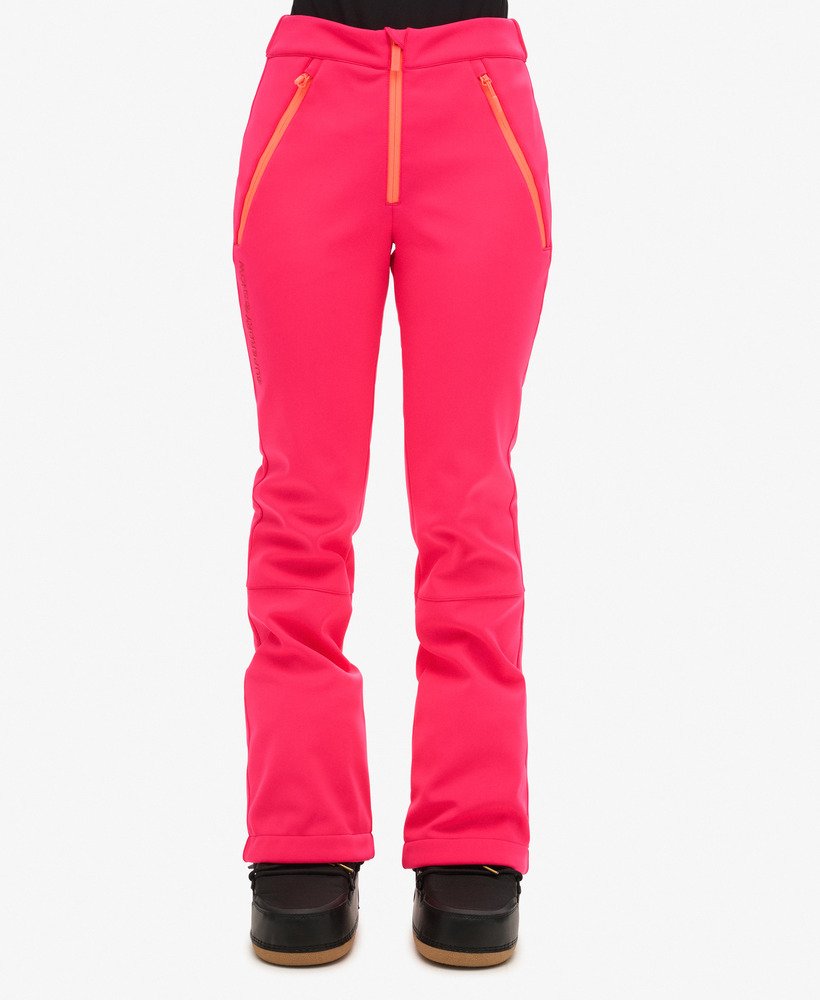 calças de esqui slim em softshell na cor rosa vibrante.