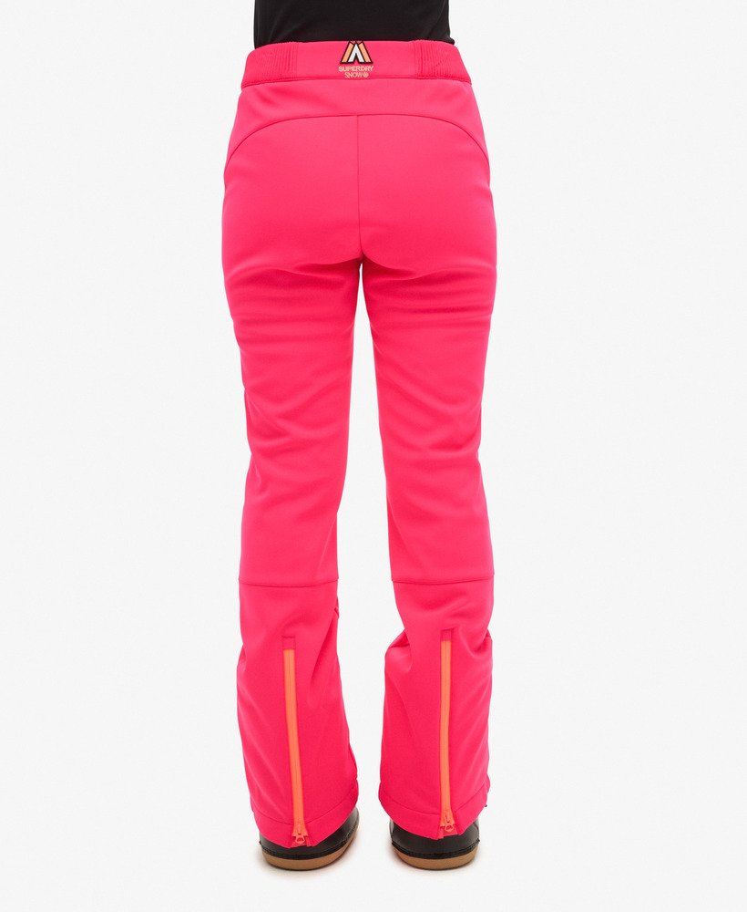 calças de esqui slim em softshell na cor rosa vibrante.