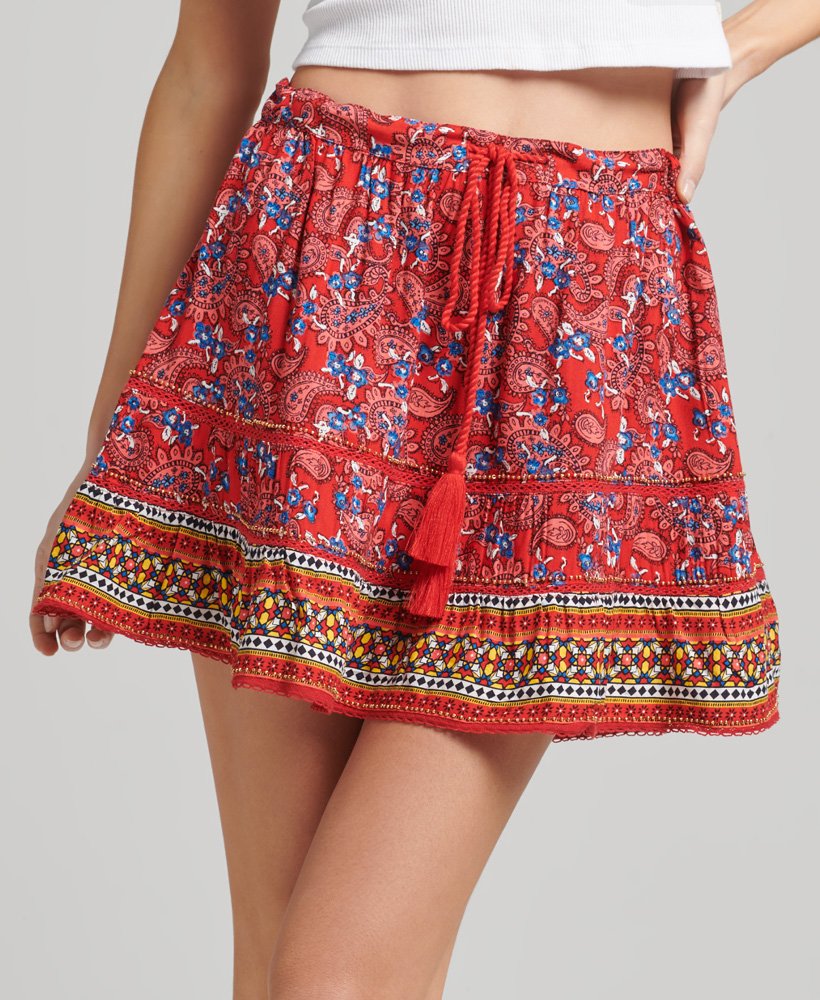 minissaia vintage bordada em estampa paisley vermelha.