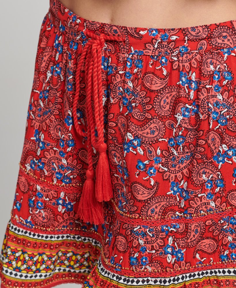 minissaia vintage bordada em estampa paisley vermelha.