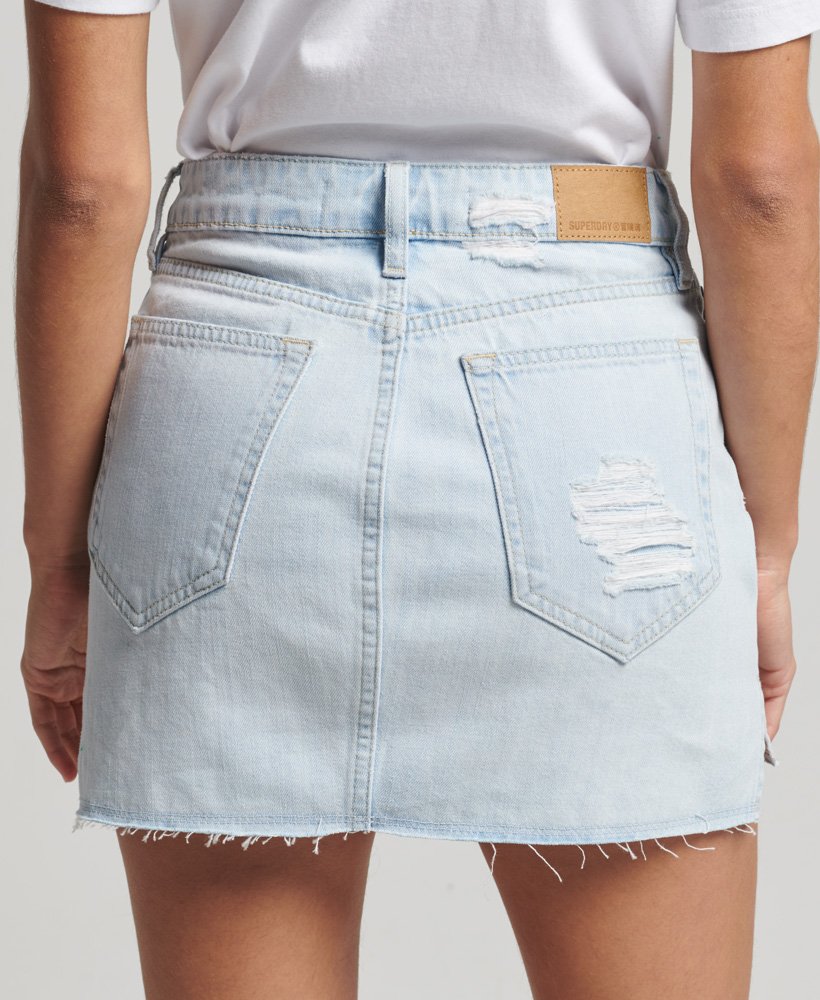 minissaia vintage em jeans na cor índigo mais claro.