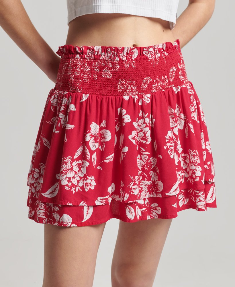 saia vintage com babados e detalhes franzidos em estampa floral vermelha.