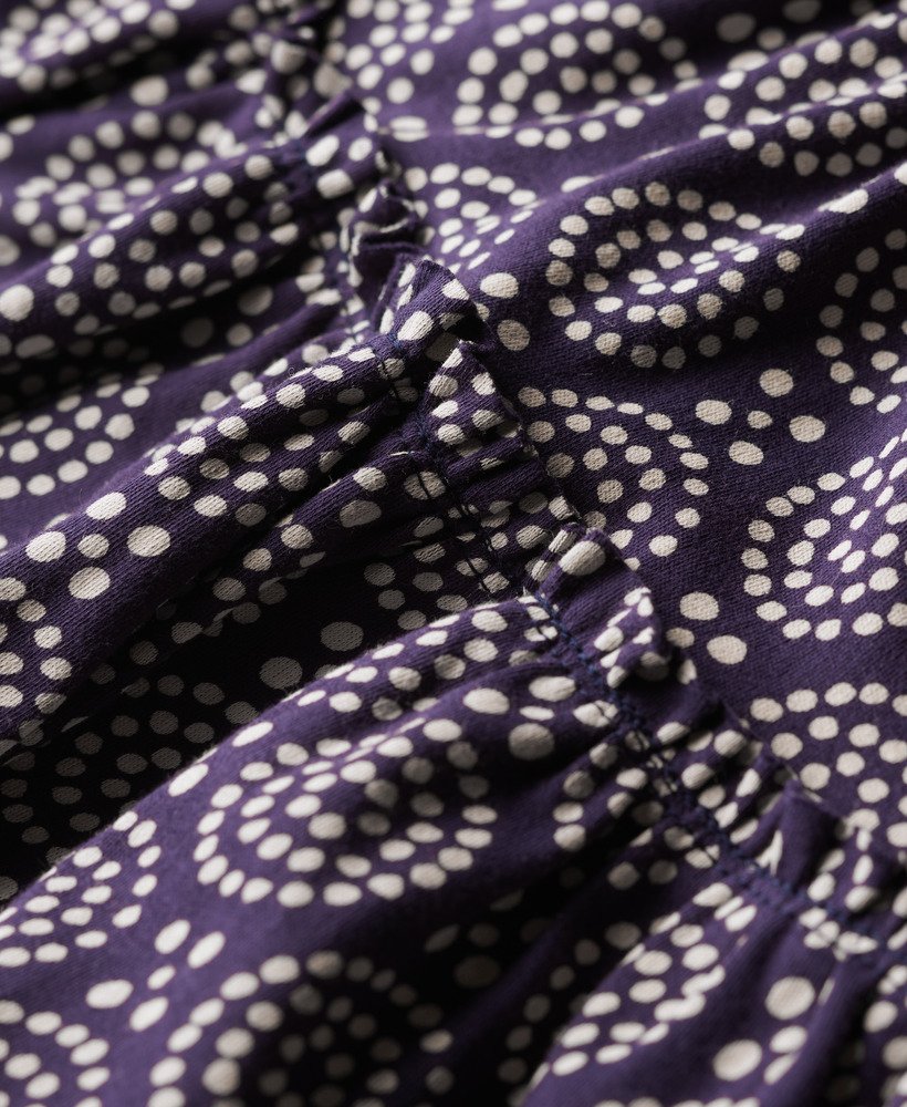 minissaia de malha com camadas e estampa floral de bolinhas azul-marinho