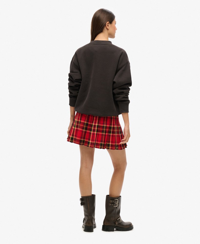 minissaia xadrez de cintura média em vermelho e preto.
