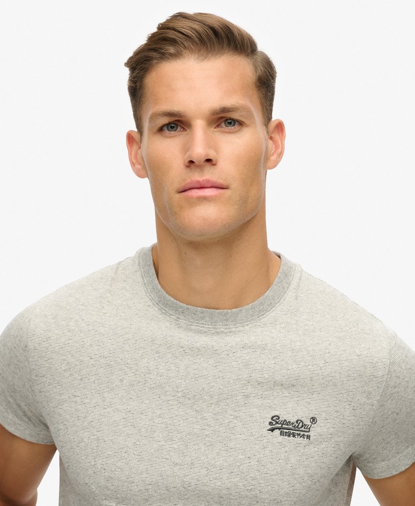 camiseta essential logo em algodão orgânico na cor pedra-pumice mesclada