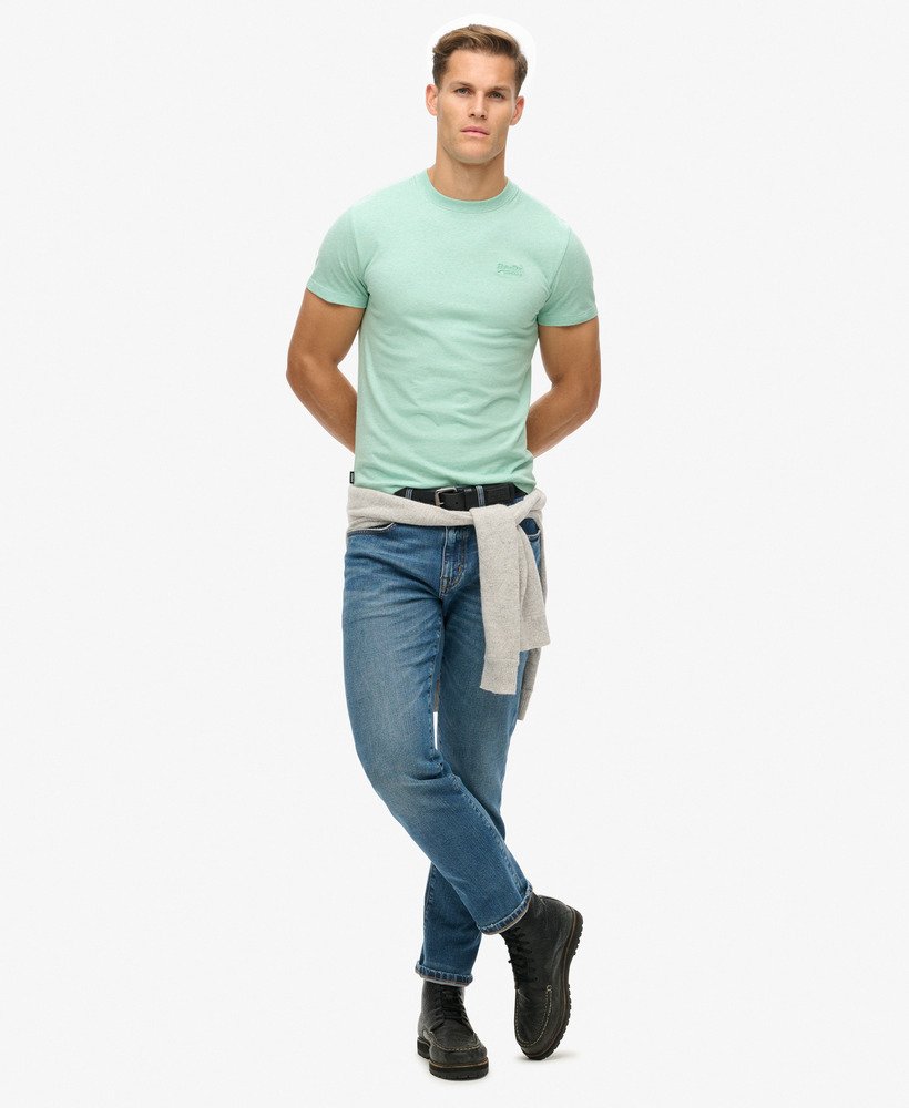 camiseta essential logo em algodão orgânico na cor verde menta mesclado claro.