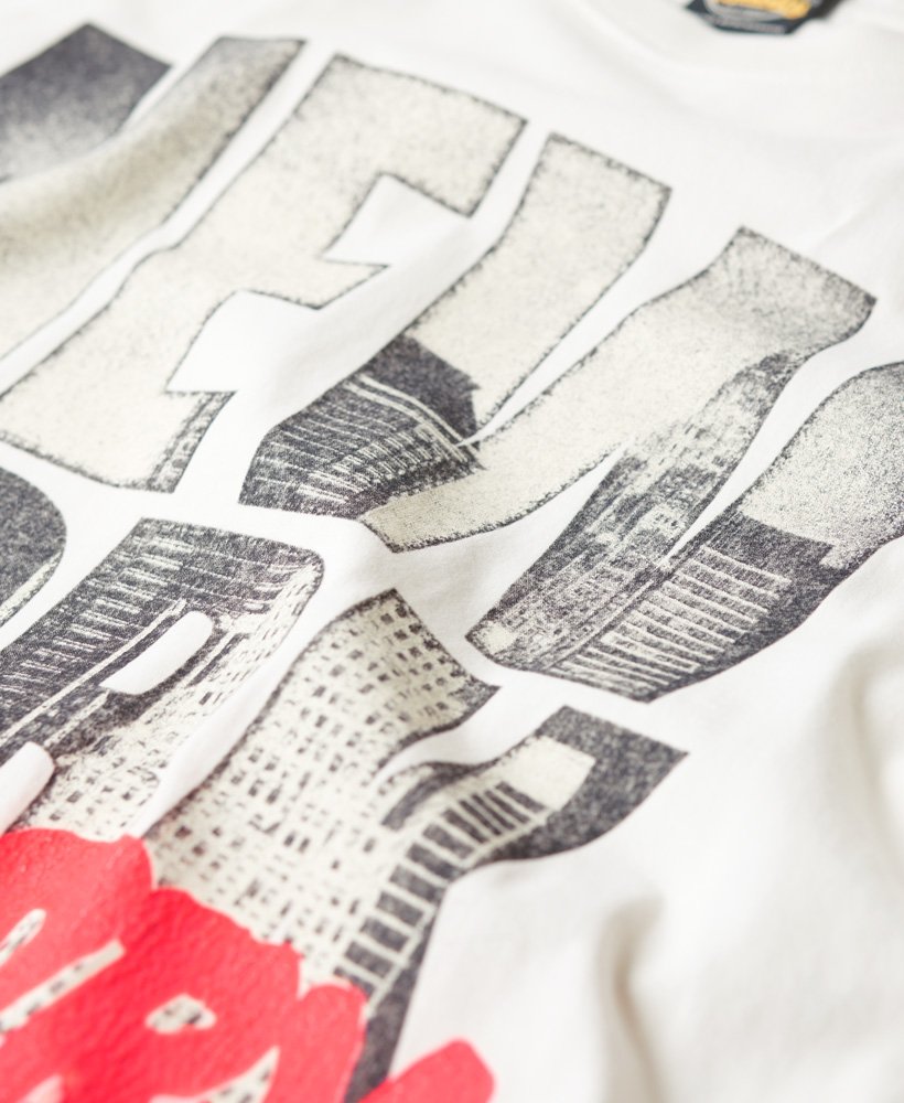 camiseta com logo de skate fotográfico na cor off white